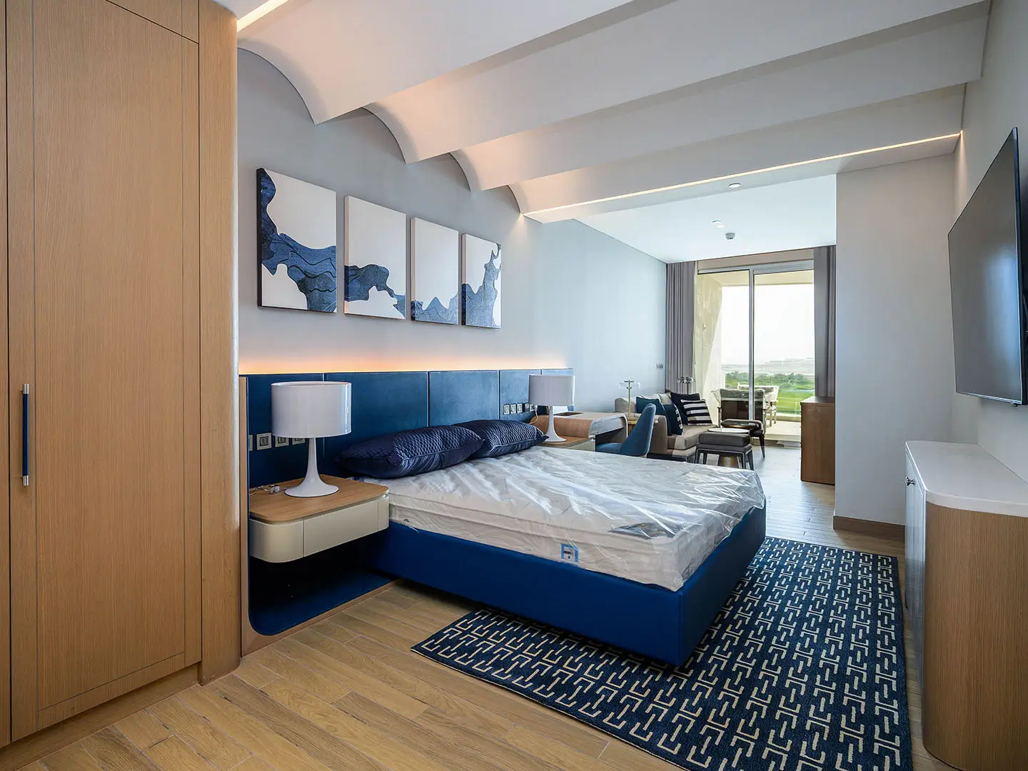 Luxury bedroom with balcony and oceanfront view