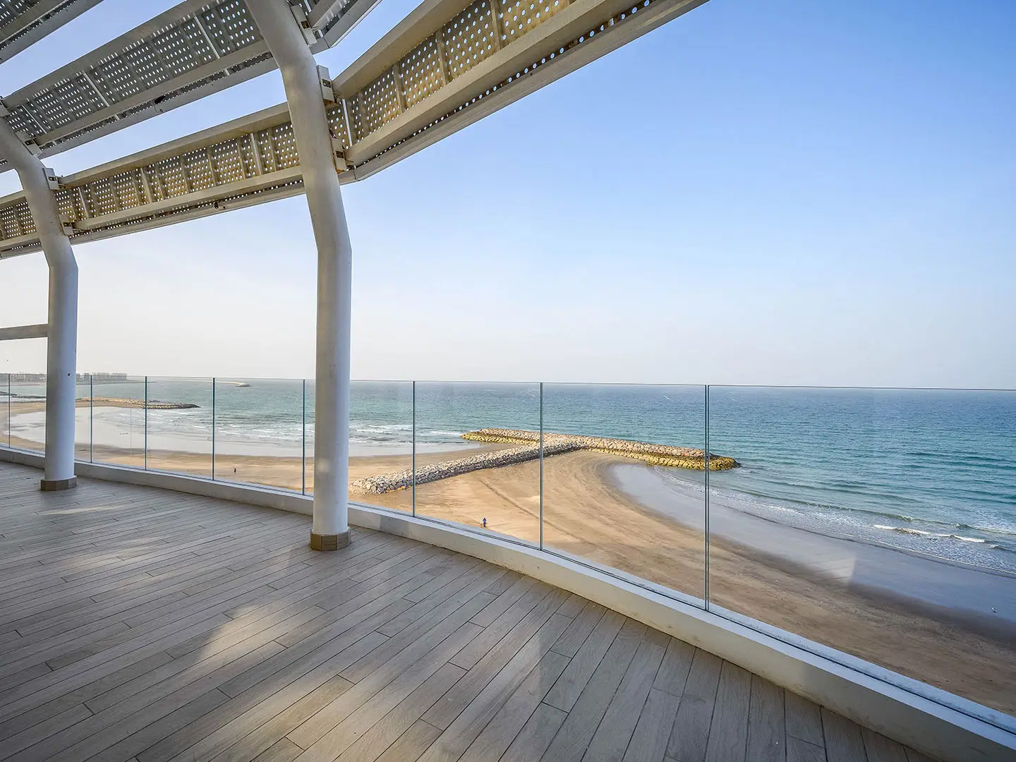 Modern terrace overlooking beach and ocean