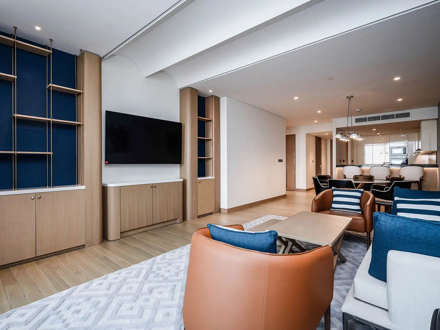 Modern open-plan living room with TV and seating