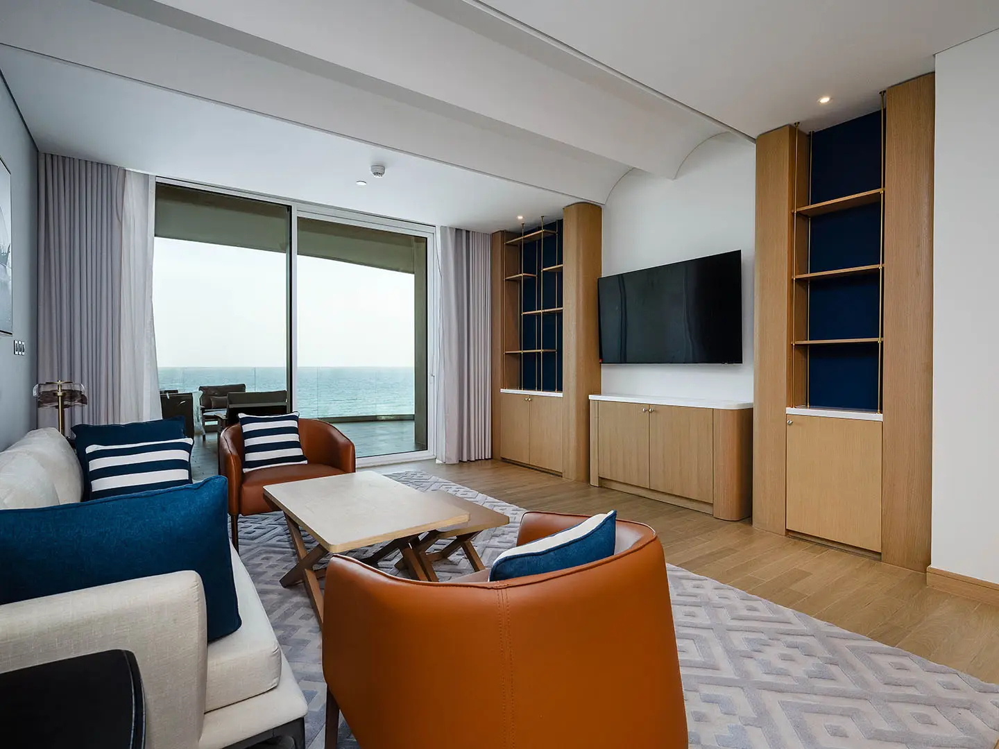 Living room with ocean view and seating