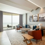 Modern living room with balcony and outdoor view